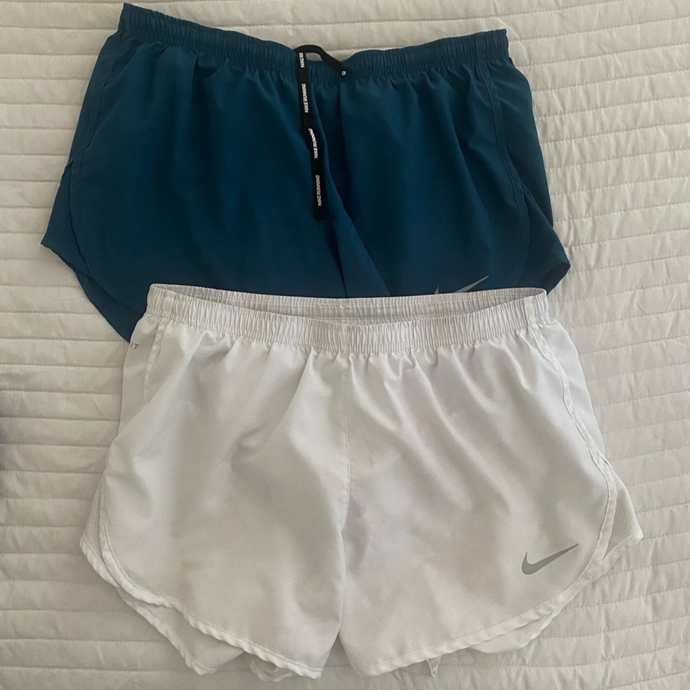 PAIR OF NIKE RUNNING SHORTS